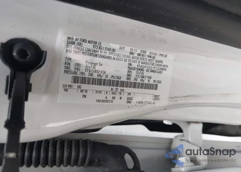 2015 Ford Focus Titanium z USA, uszkodzony, nr VIN 1FADP3N21FL238865